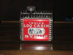 Towle's Log Cabin Syrup tin coin bank, 1970s vintage, $32. 