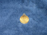 Exxon Travel Club pendant, brass, $12.  