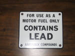 Auto-Lite Spark Plugs vertical tin sign, 11 inches x 23.25 inches, original, some paint blemishes, $495. This item can only be shipped within the Continental US. 